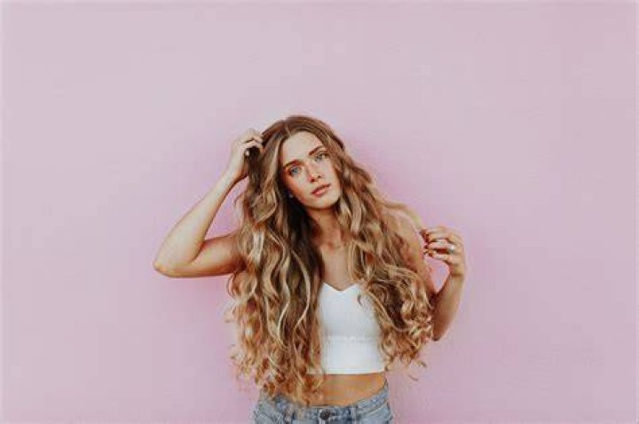 At what age hair growth stops in female?