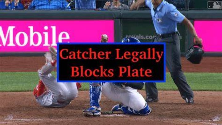 Can an infielder block a base?