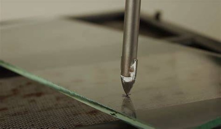 Can I drill holes in tempered glass?