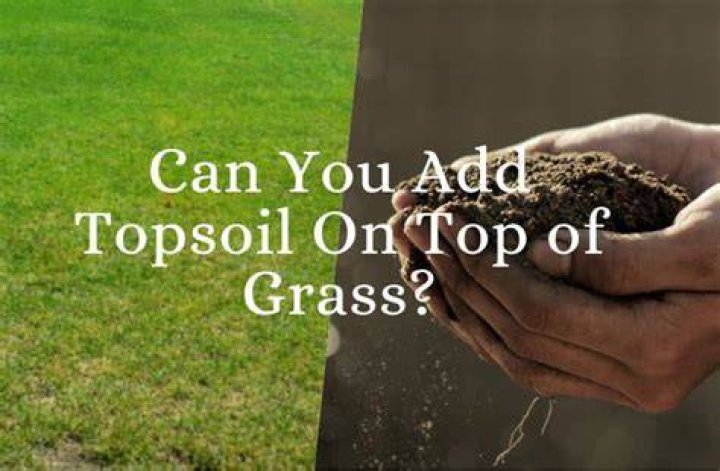 Can you add topsoil on top of grass?
