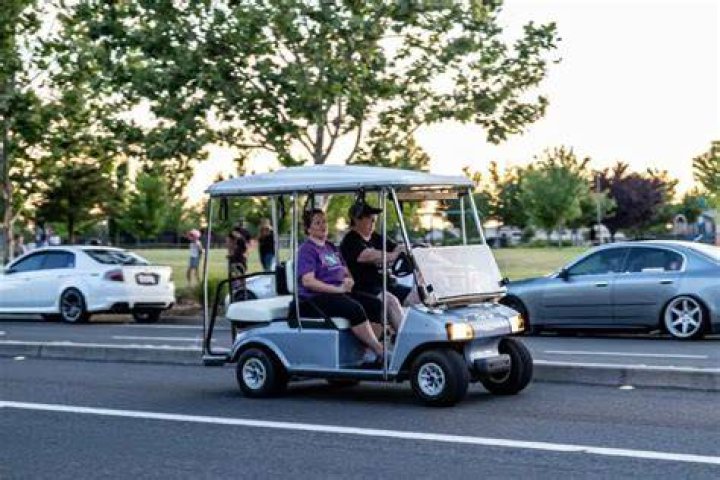 Can you drive a golf cart on the sidewalk in California?