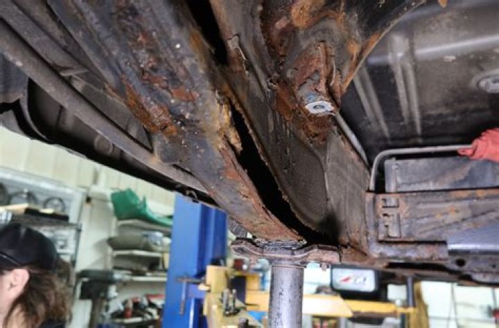 Can you put body filler over rust?