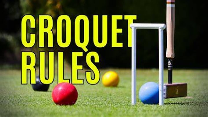 Can you put your foot on the ball in croquet?