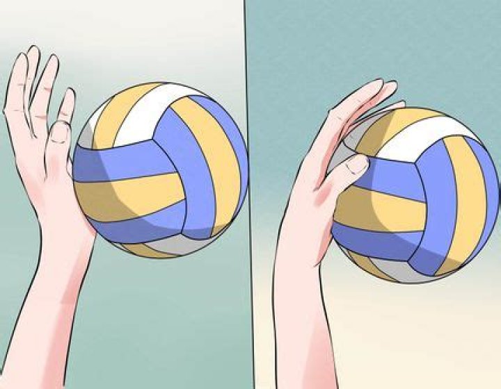 Can you spike a volleyball with 2 hands?