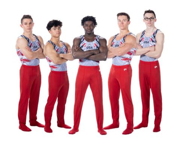 Do male gymnasts wear singlets?