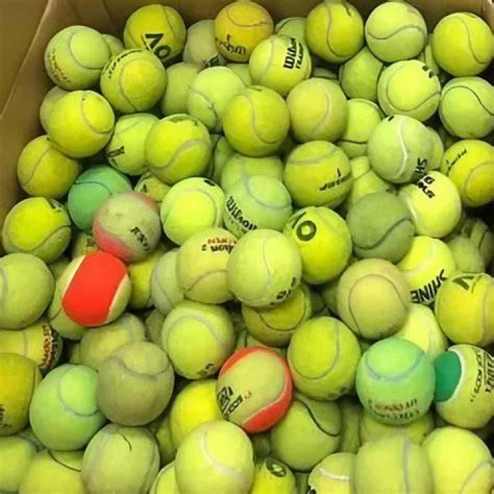 Do old tennis balls spin less?