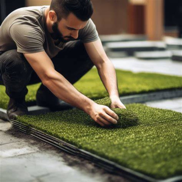 Do you have to glue down artificial grass?