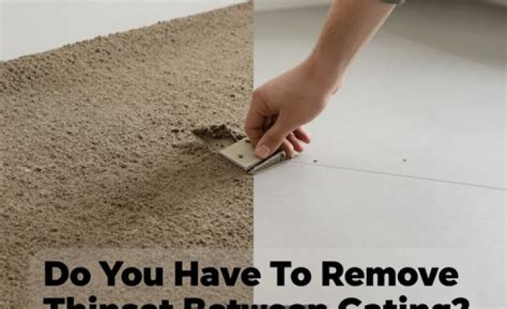 Do you have to remove thinset between tiles before grouting?