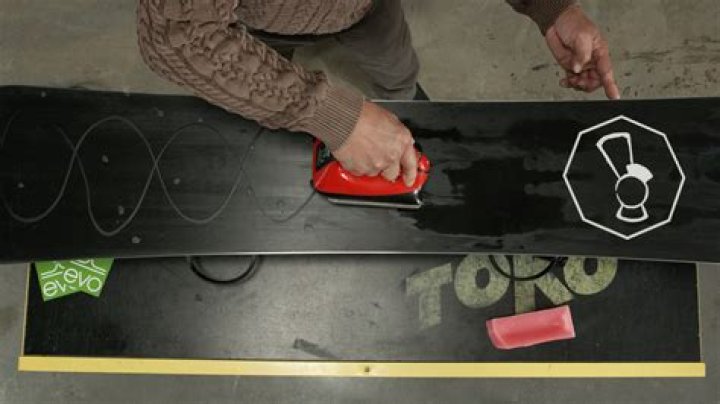 Do you have to scrape wax off a snowboard?
