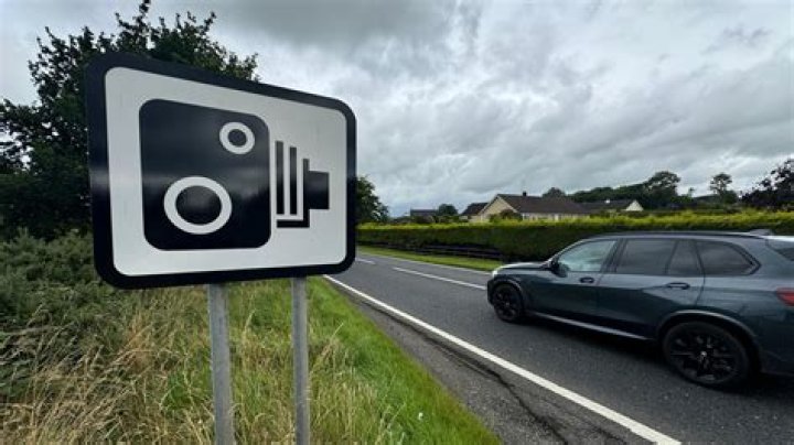 Does a speed camera flash in front or behind?