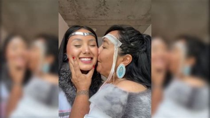 How do Eskimos kiss?