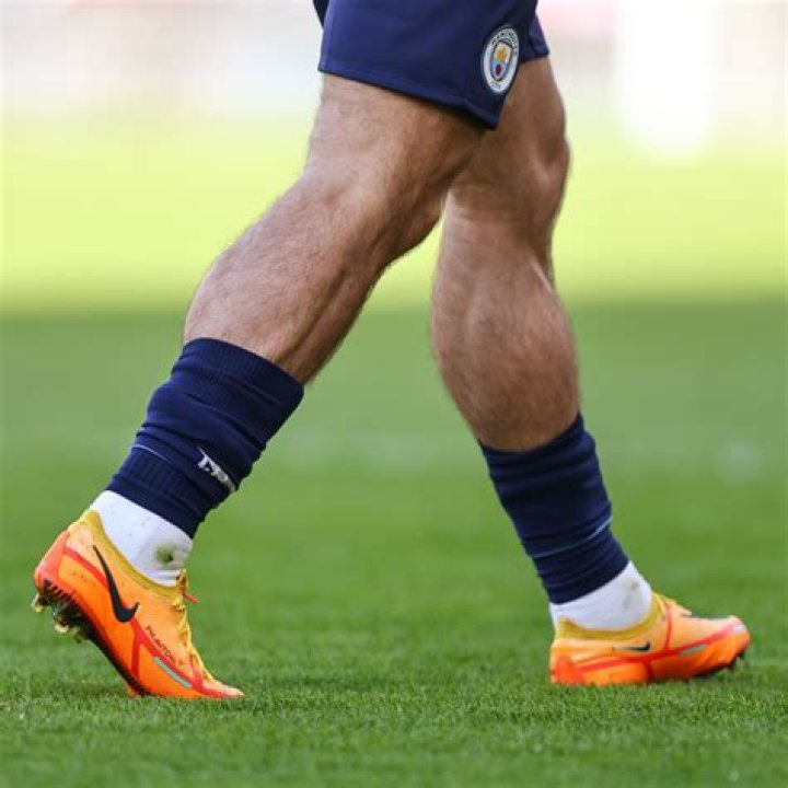 How do football players keep their feet warm?