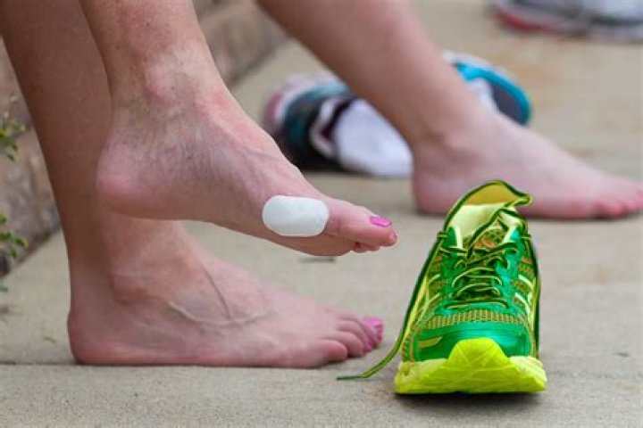 How do runners protect their feet?