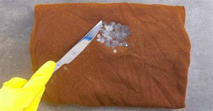 How do you get wax off a rain jacket?