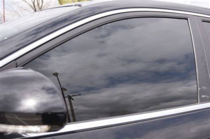 How do you smash a car window quietly?