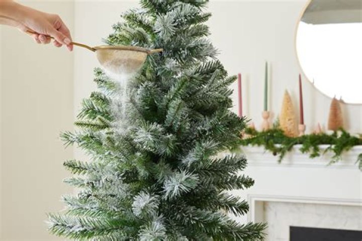 How do you temporarily flock a Christmas tree?