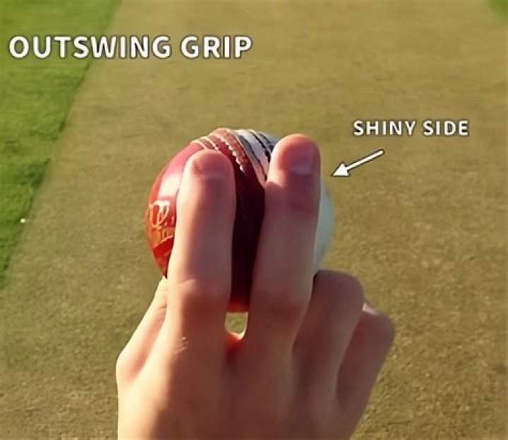 How hard should you grip a bowling ball?