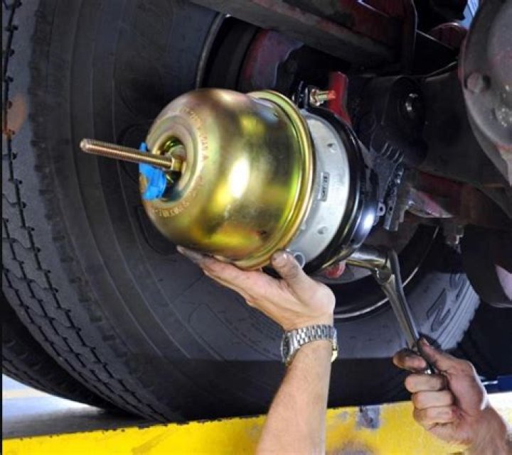 How is vacuum used to assist in applying the brakes?