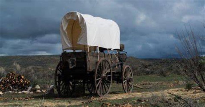 How long did it take to cross the country in a covered wagon?