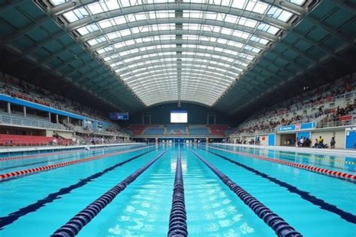 How long is a lap in an Olympic sized swimming pool?