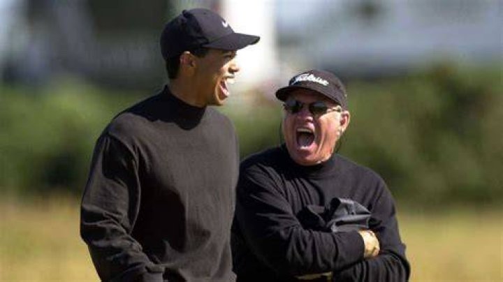 How many majors did Tiger Woods win with Butch Harmon?