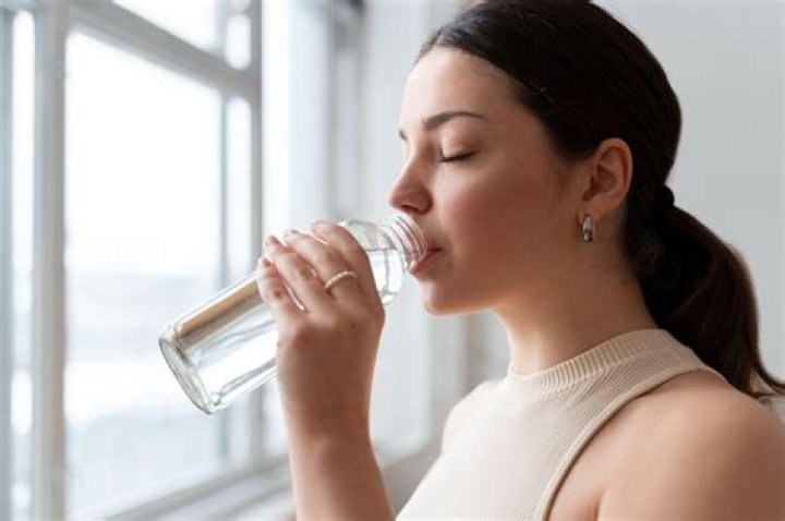 How much water should I drink before a tennis match?