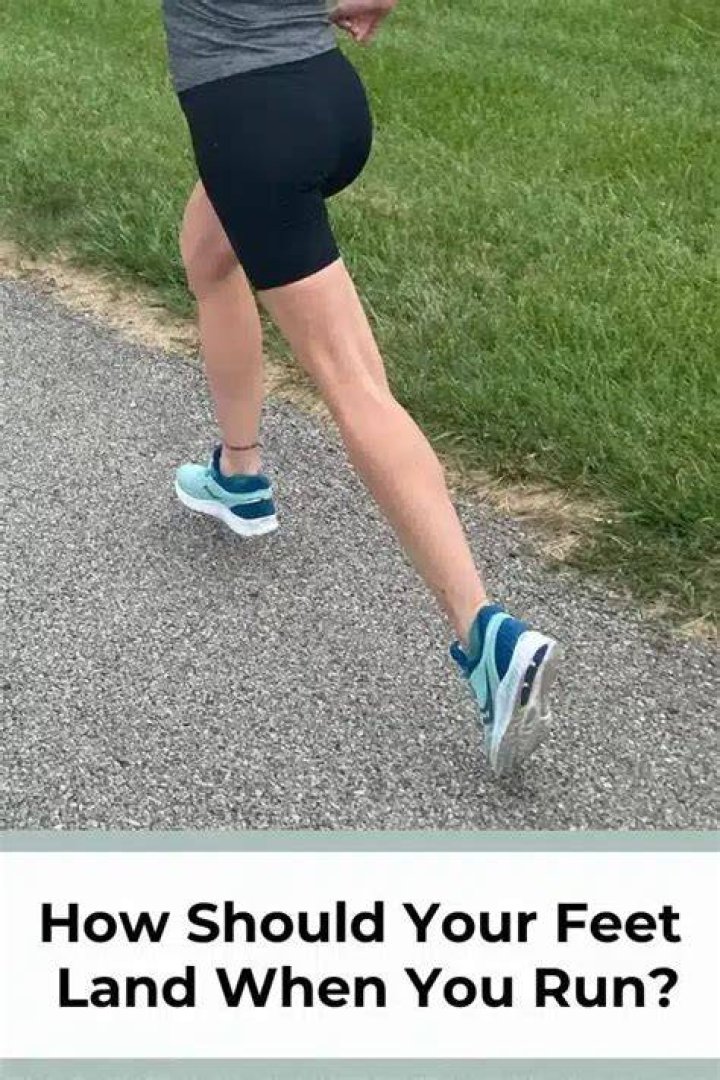 How should your feet hit the ground when walking?