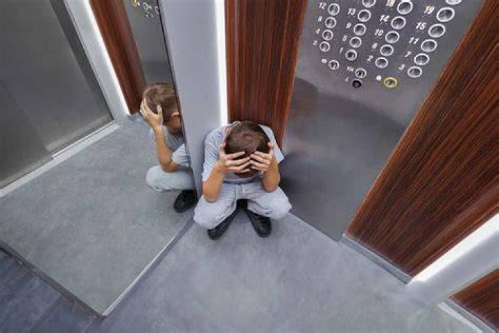 Is being stuck in an elevator an emergency?