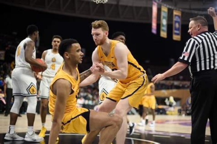 Is holding a foul in basketball?
