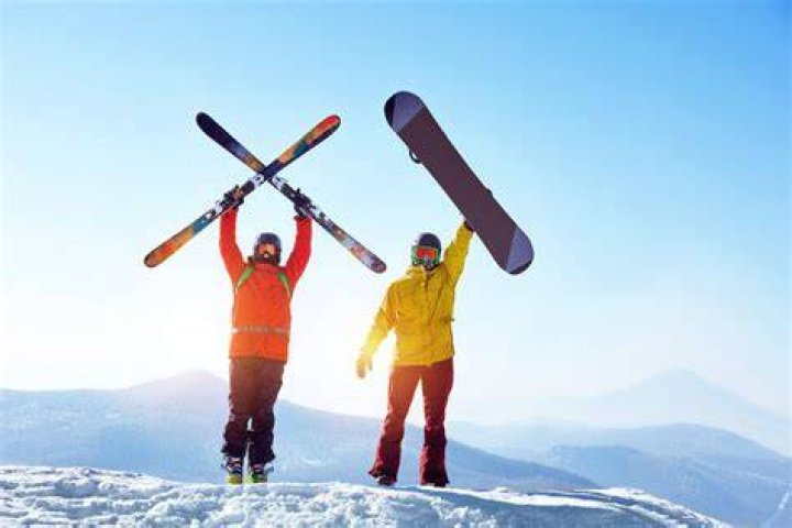 Is skiing a better workout than snowboarding?