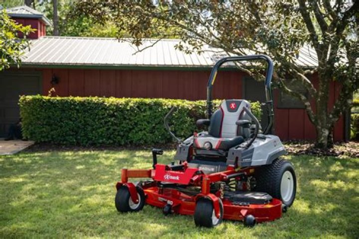 Should back wheels be higher on lawn mower?
