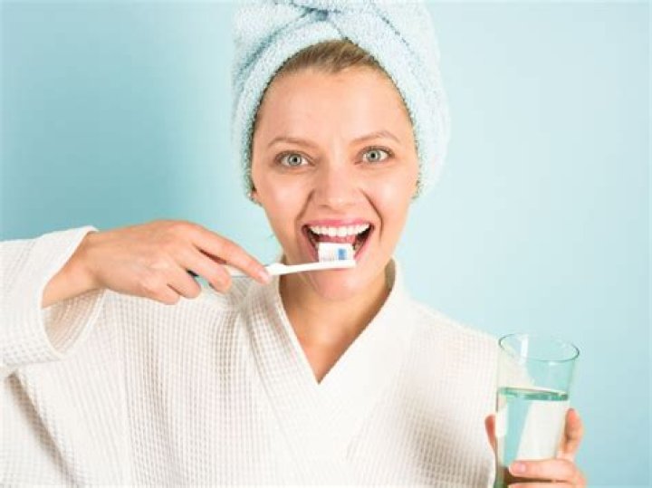 Should I rinse my mouth after brushing with Sensodyne?