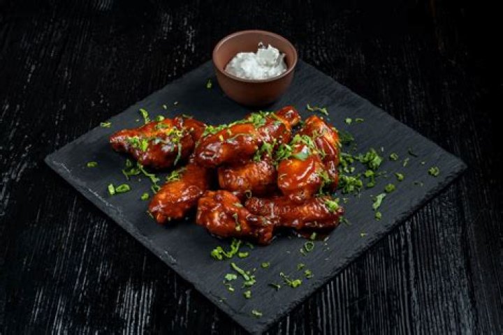 Should you marinate chicken wings before frying?
