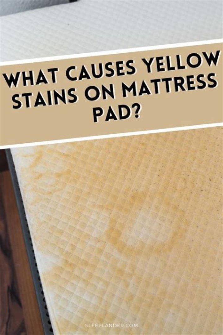 What causes yellow stains on mattress?