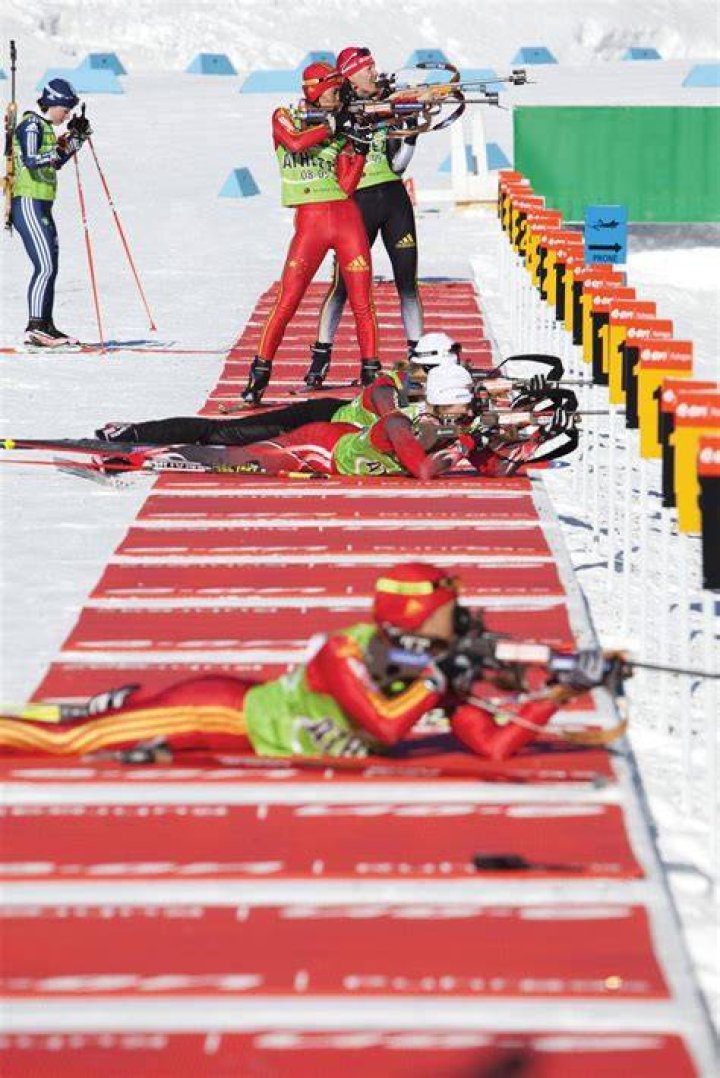 What do biathlon athletes shoot?