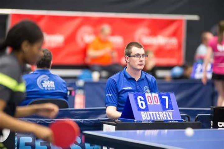 What do table tennis officials wear?