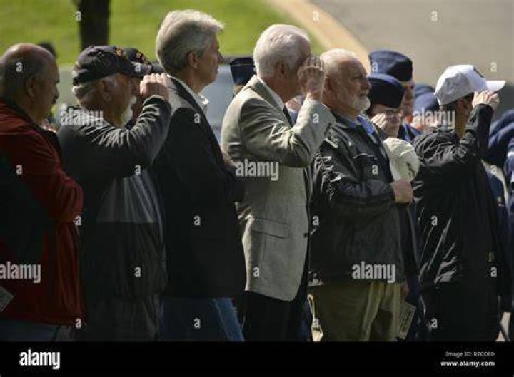 What do veterans do during the National Anthem?
