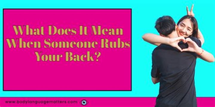 What does it mean when someone pats your back while hugging?