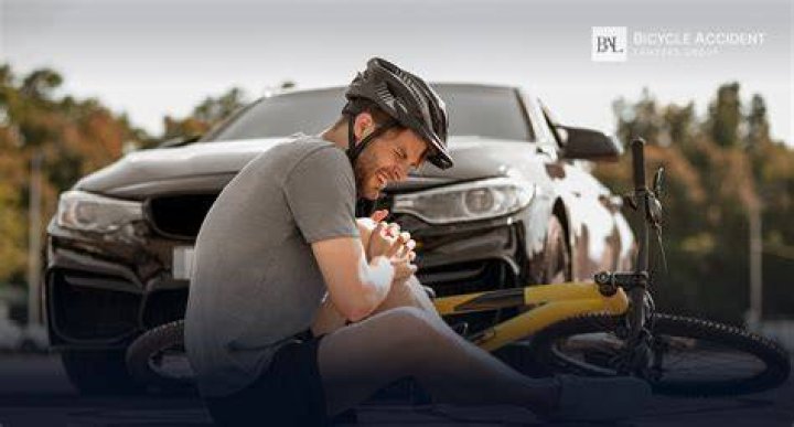 What happens if a cyclist hits your car in Ontario?