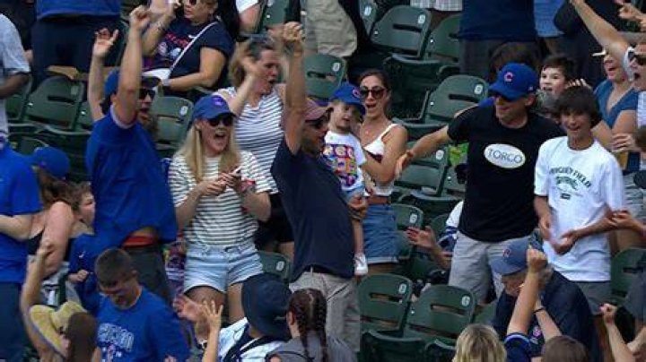 What happens if a fan catches a baseball?