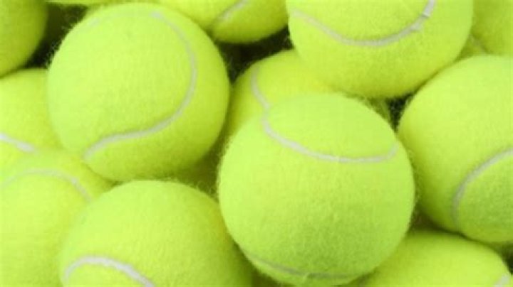 What happens when a tennis ball is heated?