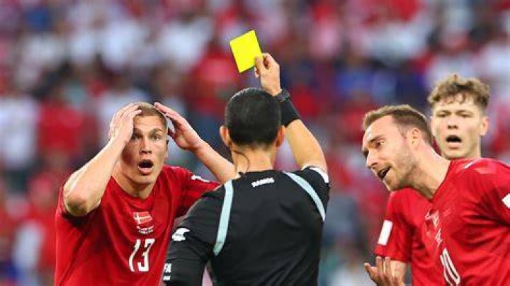 What is a yellow card in football?