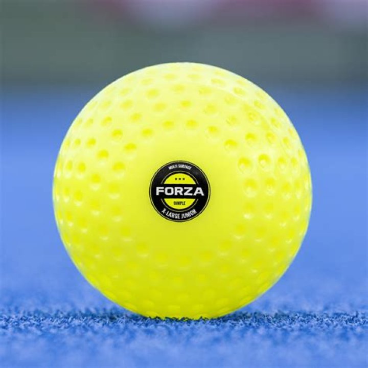 What is an Olympic hockey ball made of?