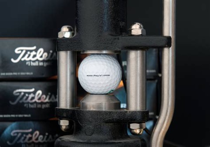 What is the compression of Titleist NXT Tour S?