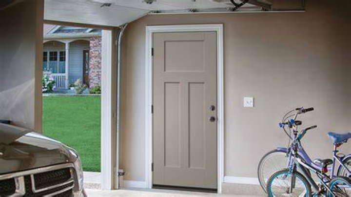 What kind of door goes between garage and house?