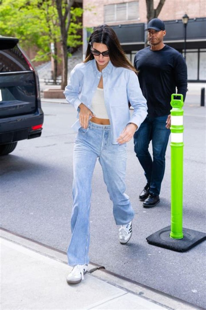What sneakers does Kendall Jenner wear?