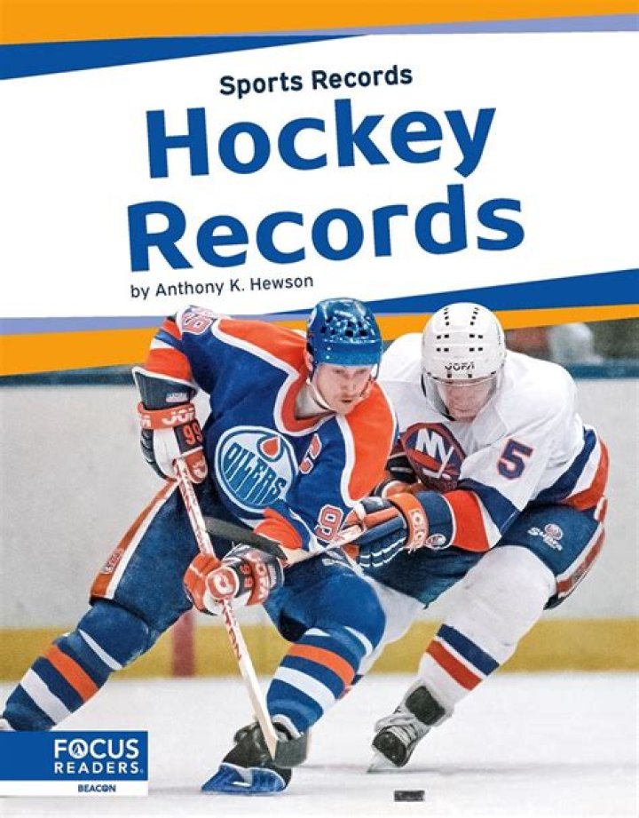 Who holds the most hockey records?