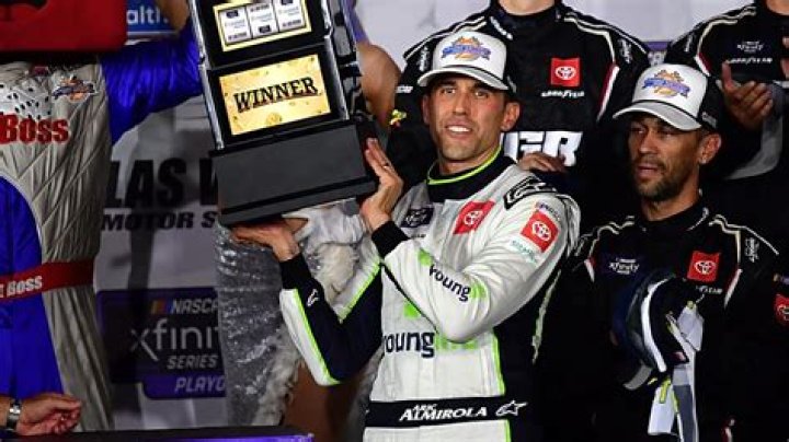 Who is Aric Almirola spotter?