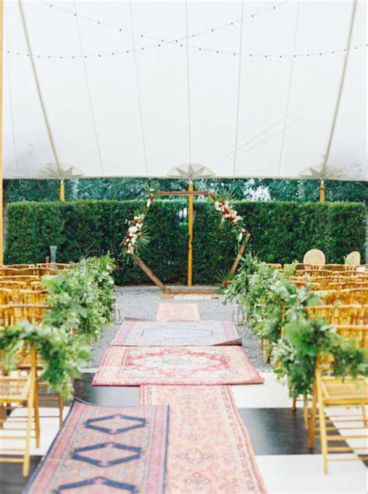Who usually walks down the aisle at a wedding?