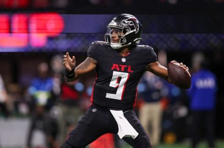 Who was the 1st black quarterback in the NFL?
